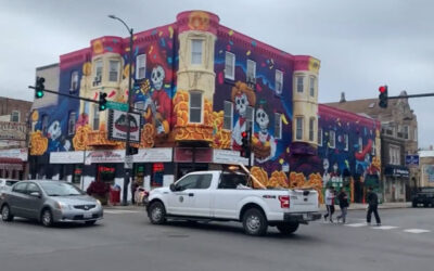 Huge Day of the Dead mural wraps around Little Village restaurant